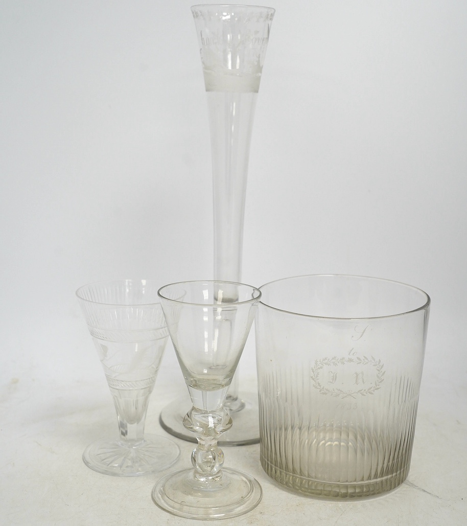 A 19th century hunting related novelty glass, a near cylindrical wine glass cooler, 1833, an 18th century wine glass and another later, tallest, 35cm high. Condition - good